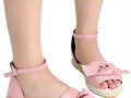 Sandalias planas con lacito en rosa