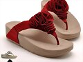 Sandalias dedo con flor, en rojo