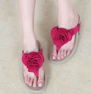Sandalias dedo con flor en rosa