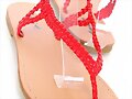 Sandalias planas de dedo en rojo
