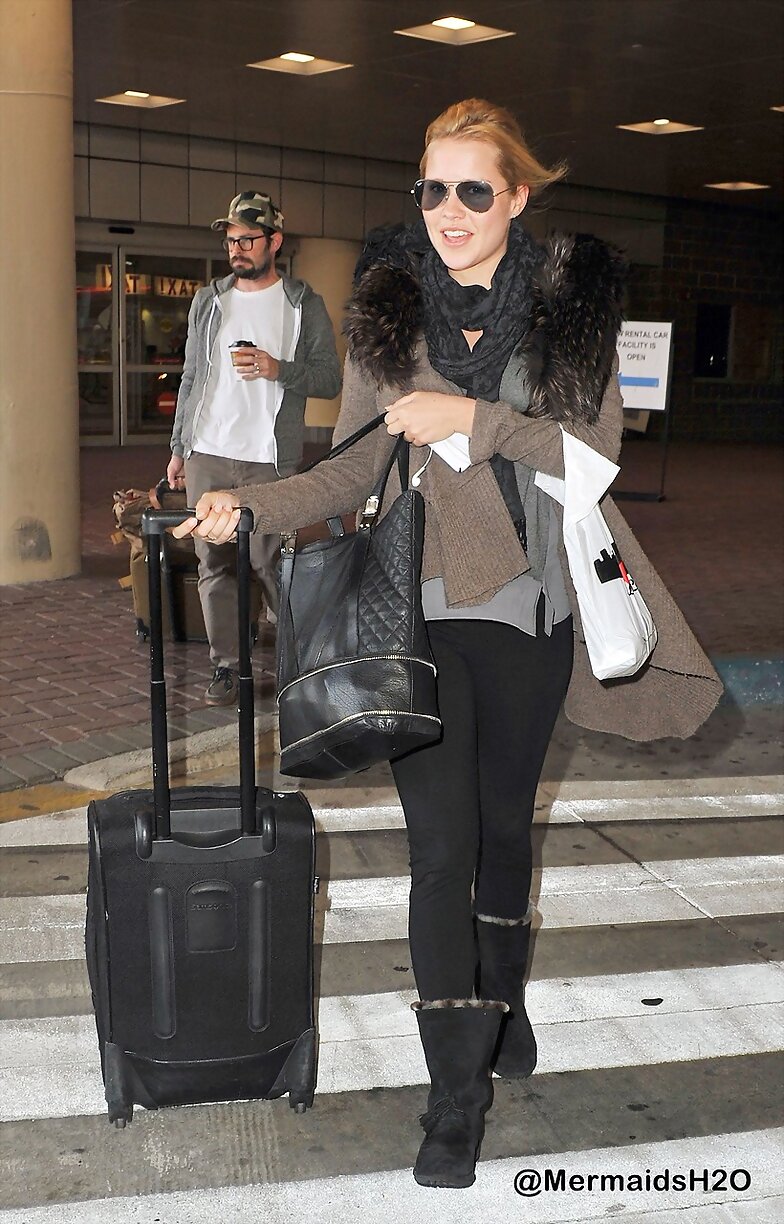 Claire Holt arrive in New Orleans (March 2013)