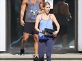 Claire Holt y su hermano Alex saliendo de gym 2014
