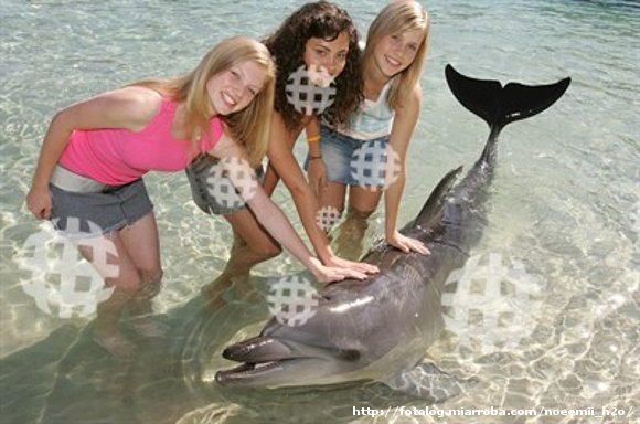 Rikki Cleo y Emma con el delfín